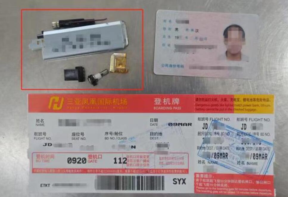 三亞機(jī)場安檢門檢測人員發(fā)現(xiàn)違禁拆分隱匿打火機(jī)[圖]